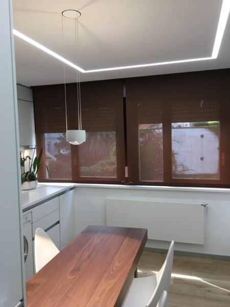 Instalación de luminaria Occhio con control gestual en apartamento en Santander (Cantabria)